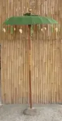 Bali umbrella, moss with metal coins and golden hearts hanging around the edge, ø 130 cm and 250cm height Moss